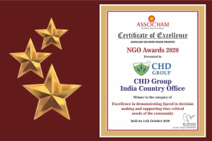 Auszeichnung der Excellence für die NGO Awards 2020 mit dem Text "Chd Group India Country Office" und einem Schild-Logo mit einem zentralen Stern und einem Lorbeerkranz, umgeben von drei Sternen auf der linken Seite.