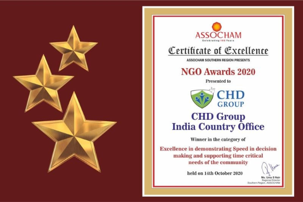 Auszeichnung der Excellence für die NGO Awards 2020 mit dem Text "Chd Group India Country Office" und einem Schild-Logo mit einem zentralen Stern und einem Lorbeerkranz, umgeben von drei Sternen auf der linken Seite.