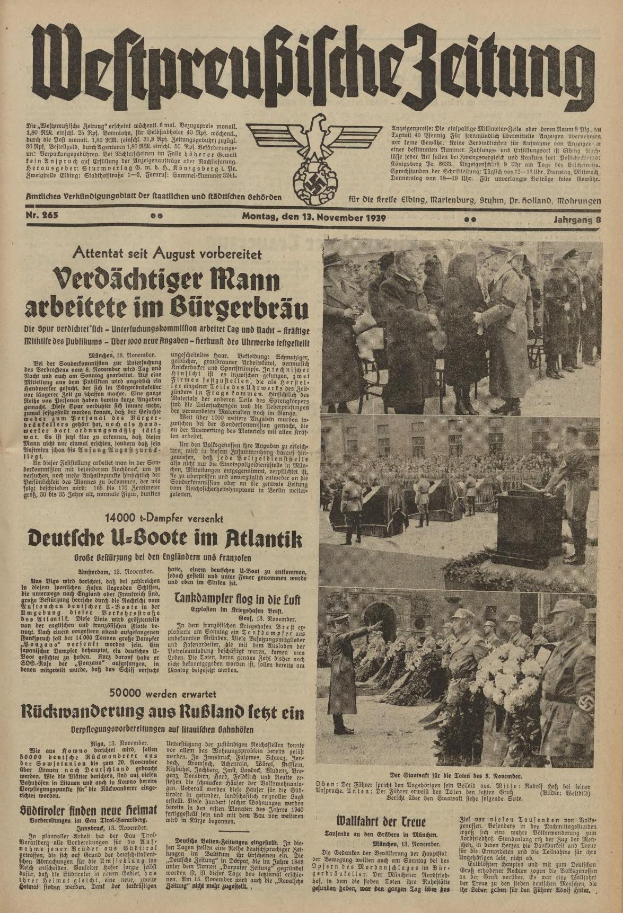 Schwarze Titelseite einer deutschen Zeitung vom 13. November 1939 mit der Überschrift "Weitpreubliche Zeitung", die eine Gruppe von Menschen in traditioneller deutscher Tracht in einer feierlichen Umgebung zeigt.
